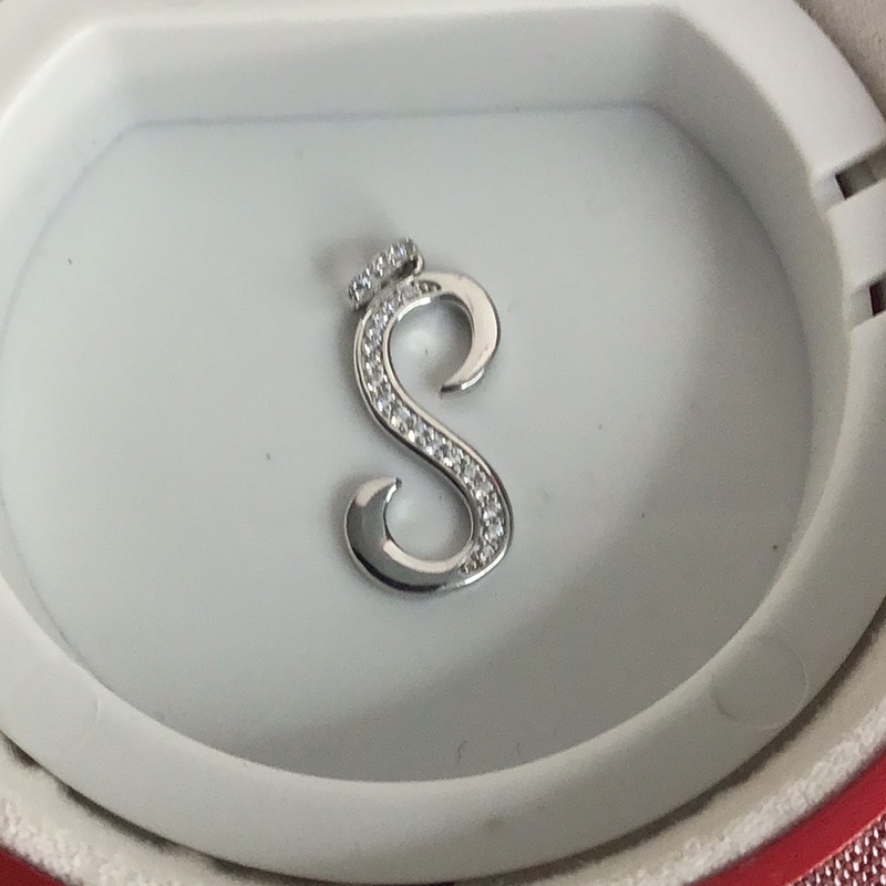 Sterling Silver Pendant With Real Diamond Accents On S As Well As The Bale 80$